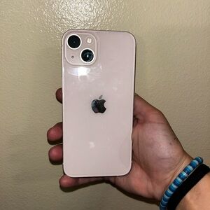 Apple iPhone 13 in light pink. Perfect condition, no cracks, no scratches